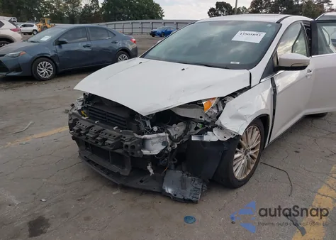 2016 Ford Focus Titanium z USA, uszkodzony, nr VIN 1FADP3N26GL222971